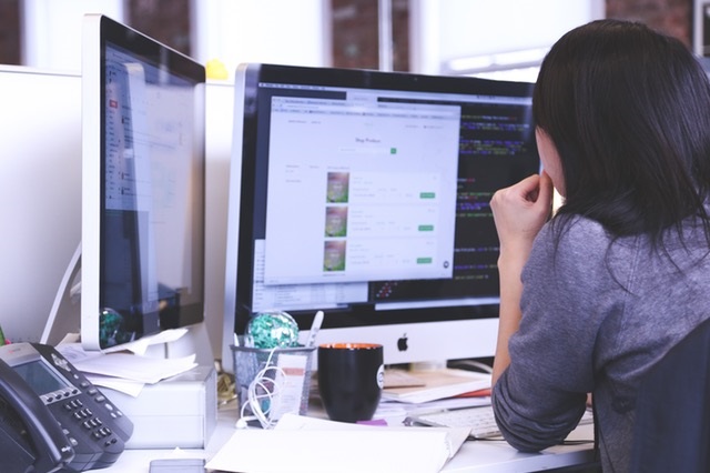 Picture of female employee working at computer